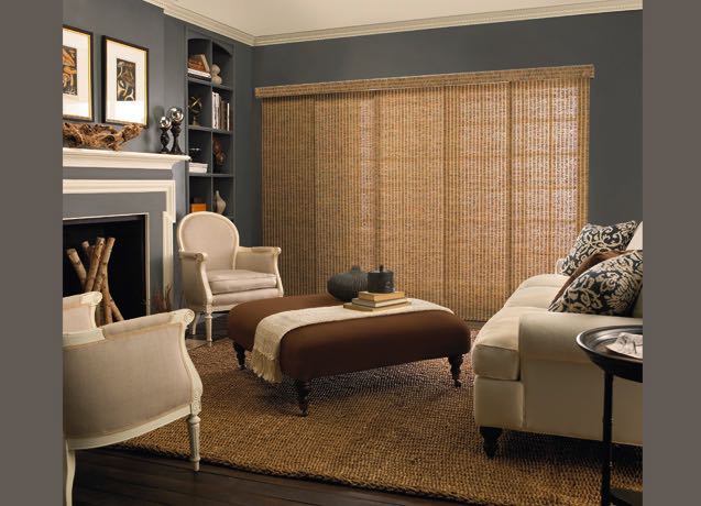 Jacksonville Family room with grey walls and beige sliding panel tracks.